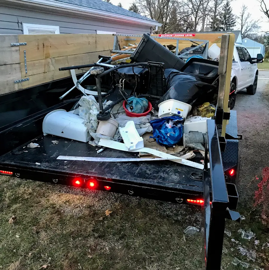 Roll-off dumpster delivered to a residential driveway in North Star